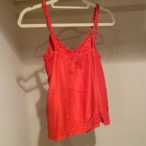 Red blouse with braided strap detail